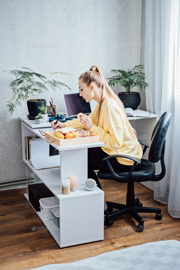 Flexible working, flexible work. Young woman freelancer working at home office