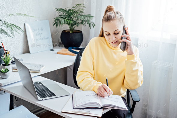 Flexible working, flexible work. Young woman freelancer working at home office