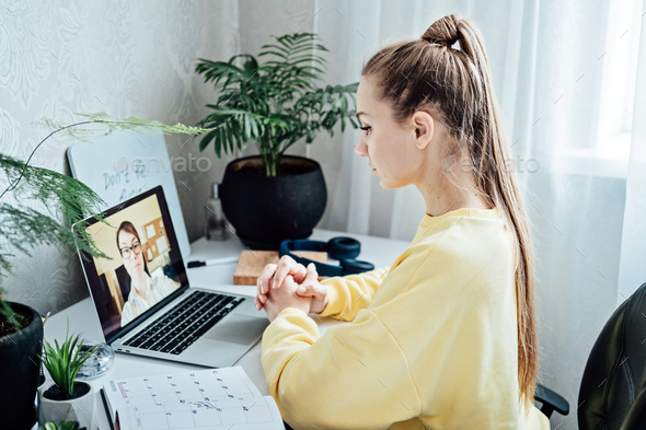 Young woman student applicant having online virtual video call job interview meeting