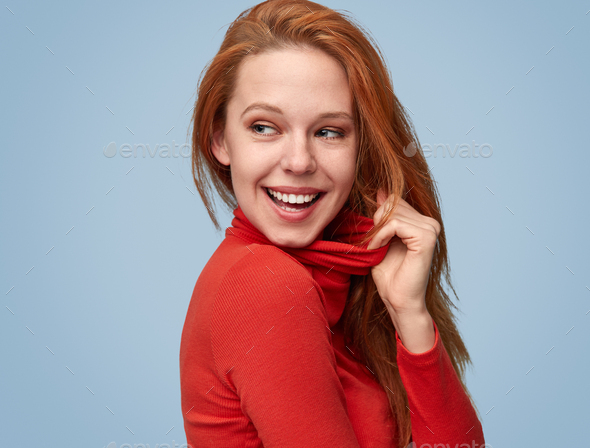 Coquette girl in red turtleneck