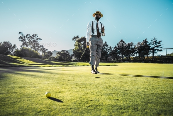 Black man on a golf field