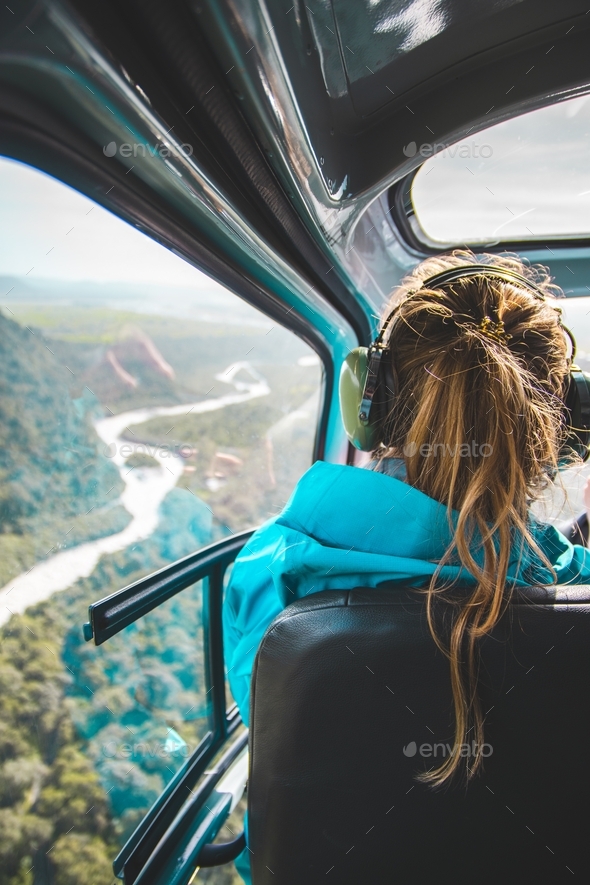 Human woman flying helicopter travel adventure sky