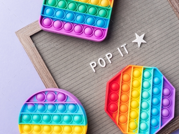 Pop it fidget toys to help reduce stress and anxiety in kids and adults and letter board