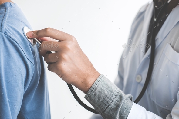 Doctor checking patient with stethoscope listening to heartbeat, Healthcare and medical concept