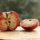 Close up of apple type with red, white, yellow and pink pulp - PhotoDune Item for Sale