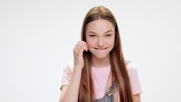 Young Beautiful Girl Smiling Over White Background alt