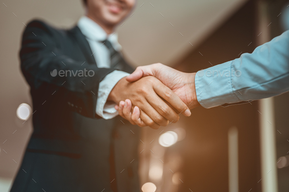 Businessman shake hands and get to know each other before they start talking about business.