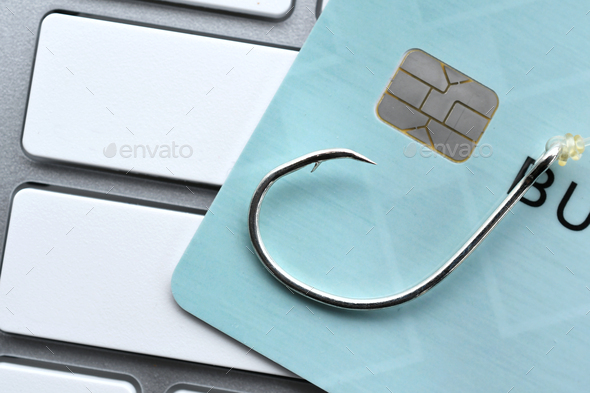 Phishing email scam fraud identity theft - credit card fishing hook blank computer keyboard mock up