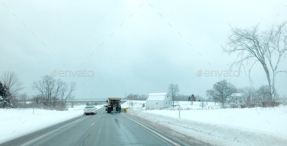 Driving Route 90 behind a snow plow on a cold winter’s day.
