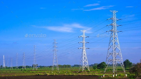 high voltage towers with cable lines in countryside Stock Photo by ...