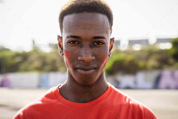 African football supporting his favorite team - Sport entertainment concept - Stock Photo - Images