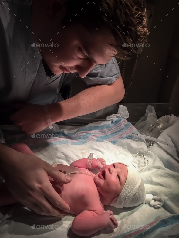Dad’s first look at newborn baby
