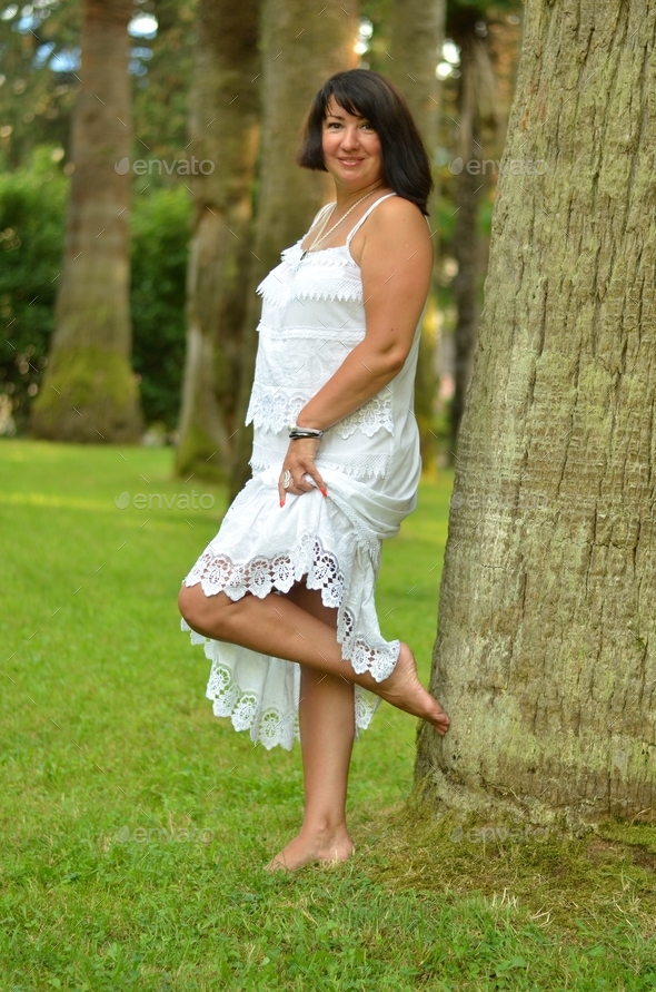 self-confident woman, 40-45 years old woman,plus size, park area, happy woman, boat trip, rest, rela