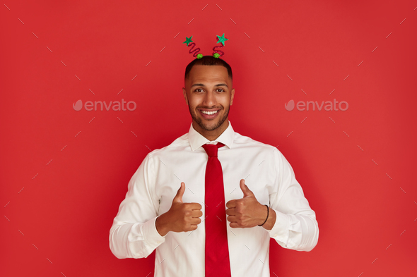 Happy Man Thumbs Up. Pleased Multiracial Man Smiling to Camera and ...