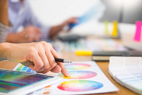 designer Editor at work drawing sketches a new project on graphic ...