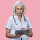 Serious senior aged woman doctor with tablet pc. - PhotoDune Item for Sale