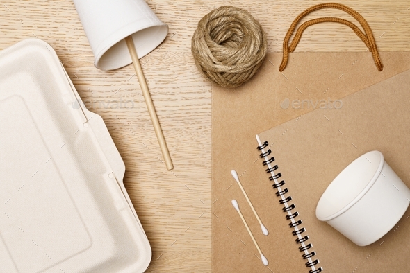 Eco friendly concept, Food box paper cup paper bag notebook and jute rope made from natural fiber.