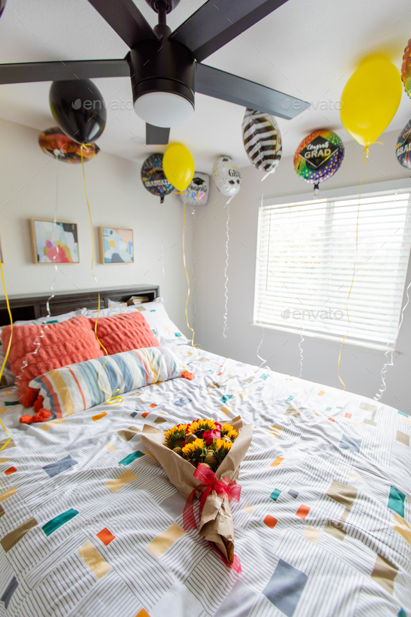 Tens bedroom full of balloons