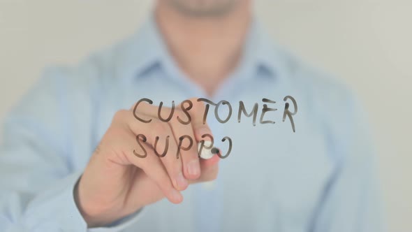 Customer Support, Man Writing on Transparent Screen alt