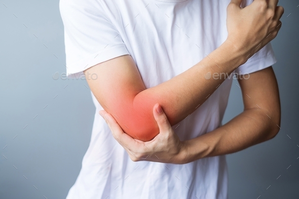 Woman having elbow ache due to lateral epicondylitis or tennis elbow. injuries and medical concept