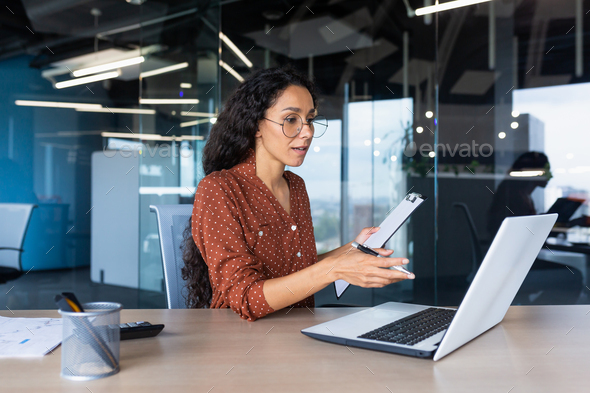 Portrait Successful Businesswoman, Latin American Woman Shows A Report 