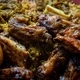 Traditional Jamaican jerk chicken wings, curried goat and fried dumpling with rice and peas - PhotoDune Item for Sale