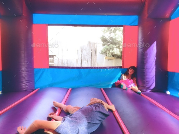 Kids in bounce house. Stock Photo by wdnesday | PhotoDune