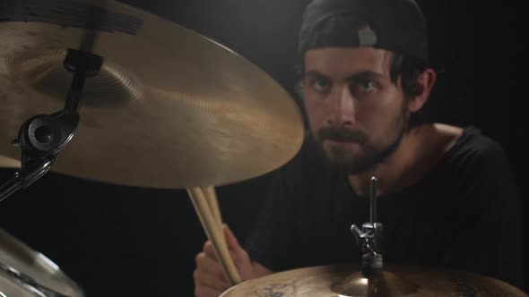 Young Drummer Making Rhythm on Drum Kit Slow Motion alt