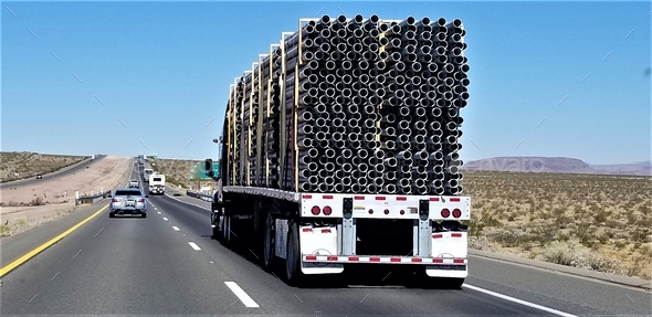 Trucking! Hauling Pipe! - Stock Photo - Images