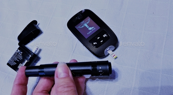 Diabetes! Testing Blood Glucose! Diabetic Test Kit! - Stock Photo - Images