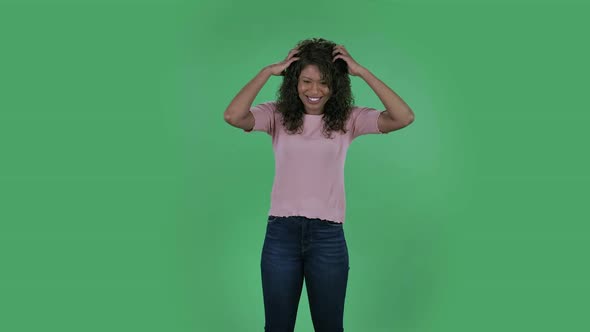 Portrait of Beautiful African American Young Woman Looking at Camera Is Shocked and Very Upset alt