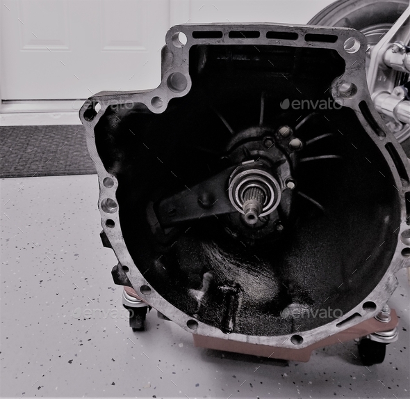 Looking Inside the Transmission Transfer Case Removed from a Sports Car