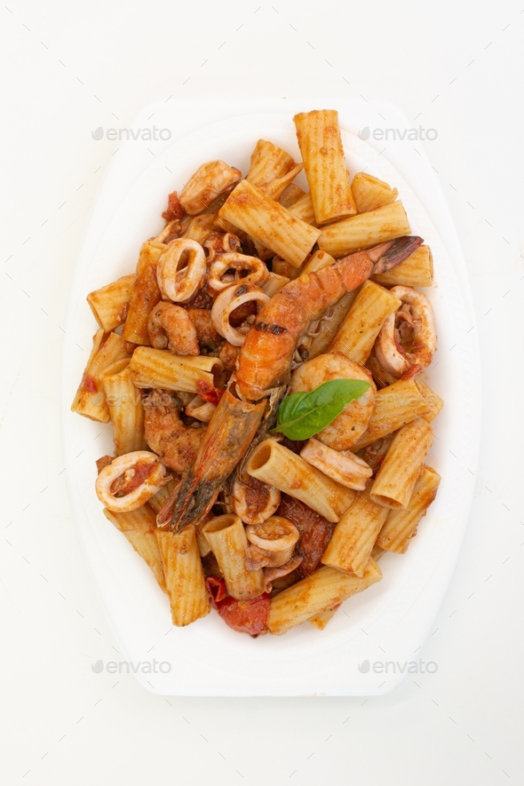 Rigatoni with seafood. Pasta marinara. Prawns. Tomato sauce. Italian