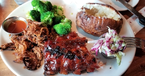 Dining Out! Delicious Dinner with Barbeque Ribs, Pulled Pork, Baked Potato, Broccoli and Cole Slaw!