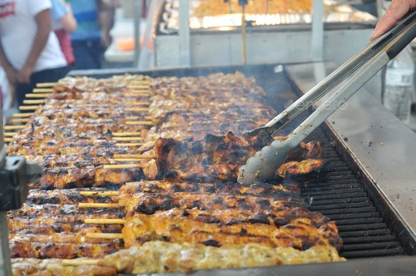 Food Truck Grilling at a Local Summer Street Festival