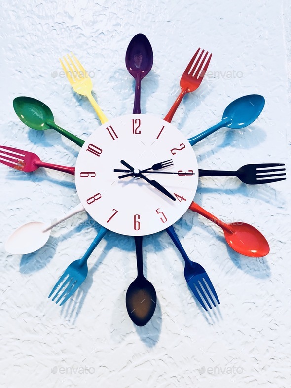 Wall clock with plastic ware.