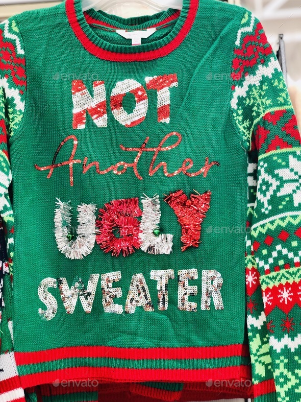 A green and red ugly Christmas sweater.