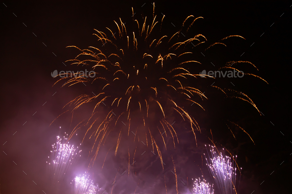 Fireworks at New Year. Abstract holiday background. - Stock Photo - Images