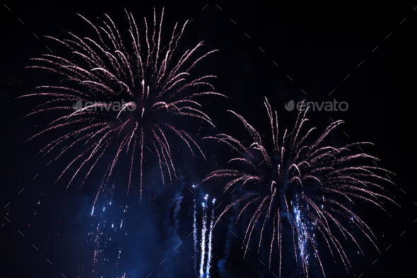 Fireworks at New Year. Abstract holiday background. - Stock Photo - Images
