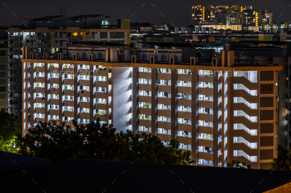 Glow in the dark! An HDB flat (public housing) in Singapore at night.