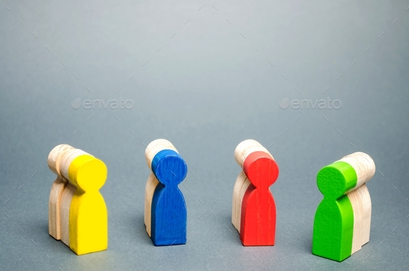 Groups of multicolored wooden people