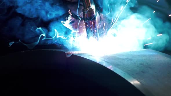 Welder Working with Metal