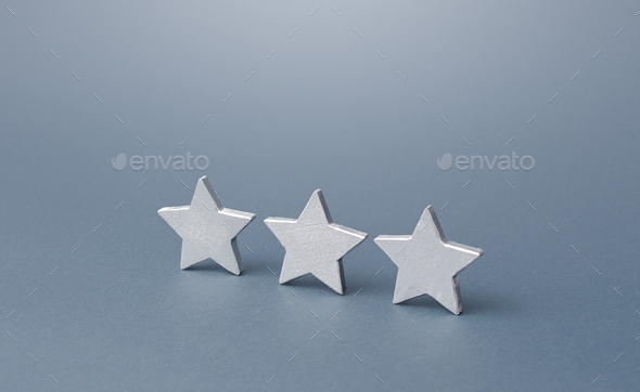 Three gray stars. Rating evaluation concept. Service quality. Buyer feedback. High satisfaction