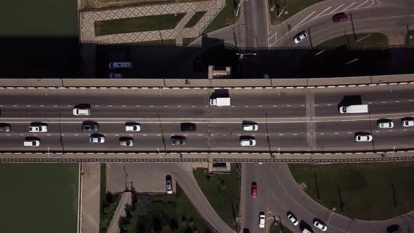 Drone's Eye View -  Roads Aerial View of Urban Traffic Jam on a Car Bridge. alt