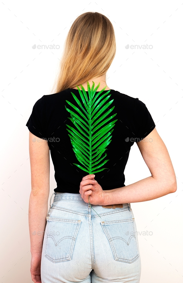Green fern on female back,spine and woman health concept