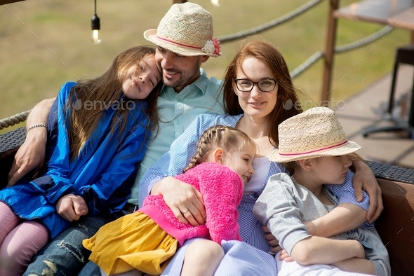 Happy family- mother,father and three children daughter relaxes on ...