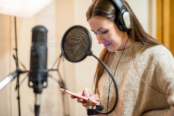 Sound recording studio with equipment and singer Vector Image