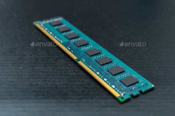 The computer's RAM is on a black surface - Stock Photo - Images