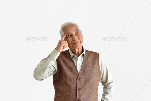Confusing and forgetful elderly asian man with thinking gesture