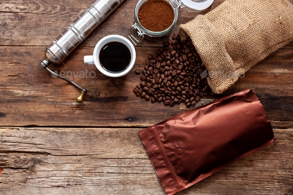 Coffee background. Packing coffee in a vacuum bag, a canvas bag, in a glass jar. Ground coffee